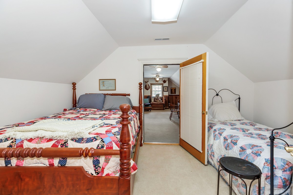 49 Crystal Ridge Road Mulberry, TN 37359 - Photo 20 of 58 a bedroom with a bed and a lamp