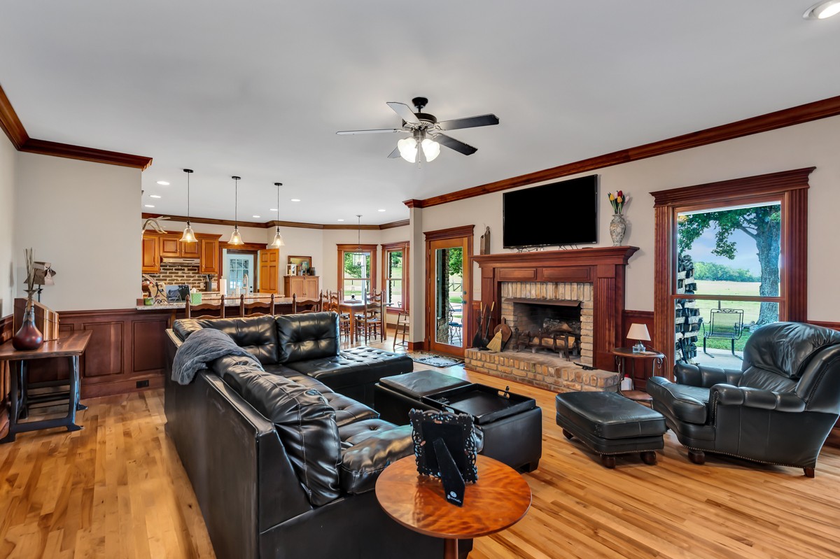 49 Crystal Ridge Road Mulberry, TN 37359 - Photo 6 of 58 a living room with furniture fireplace and flat screen tv