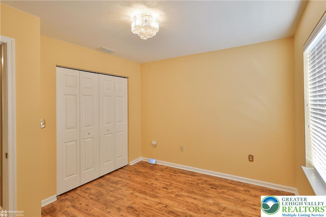 1302 Adams Street Northampton, PA 18067 - Photo 24 of 57 a view of empty room with a window and wooden floor