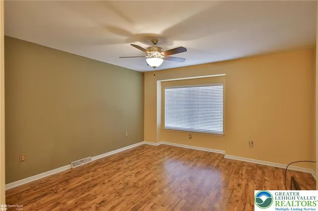 a bathroom with a sink a vanity and a mirror