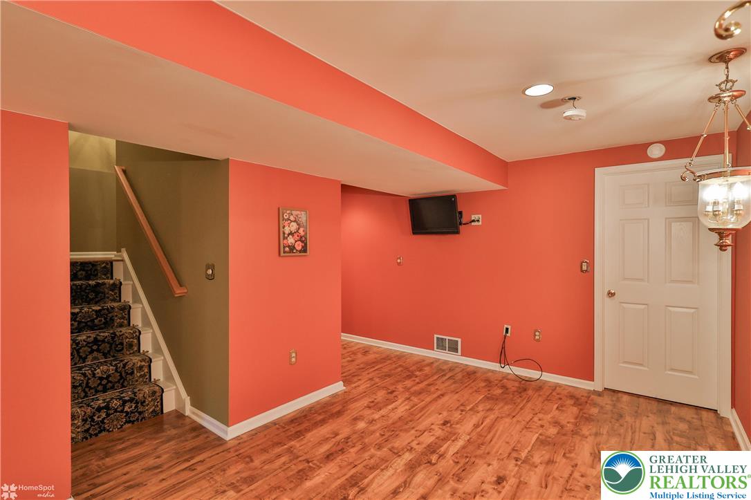 1302 Adams Street Northampton, PA 18067 - Photo 38 of 57 a view of entryway with stairs and wooden floor