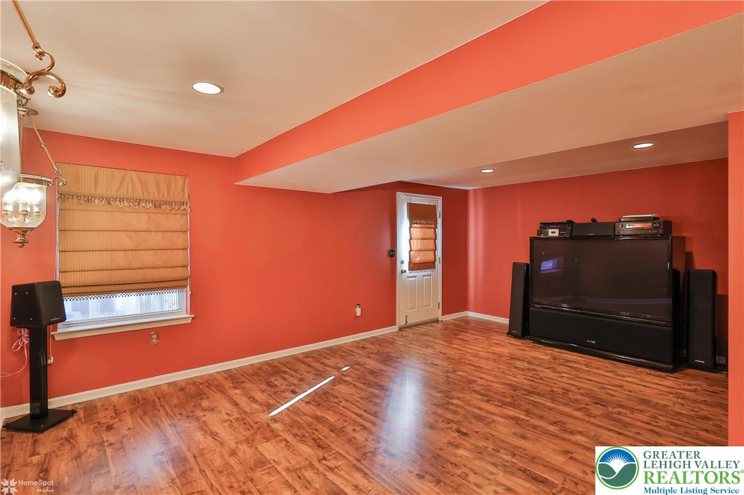 1302 Adams Street Northampton, PA 18067 - Photo 42 of 57 a bedroom with a bed and a flat screen tv