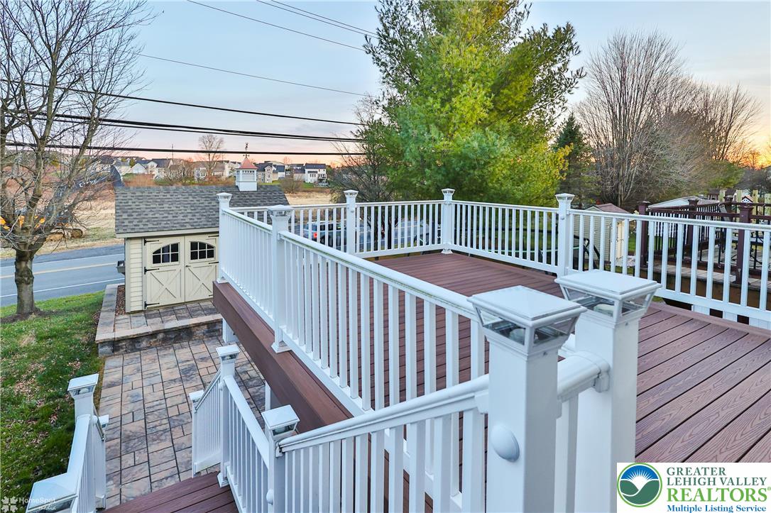 1302 Adams Street Northampton, PA 18067 - Photo 50 of 57 a view of balcony with wooden floor and fence and a couple of benches