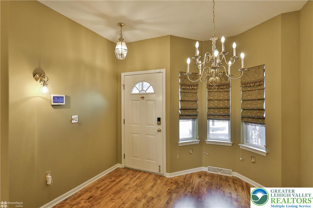 1302 Adams Street Northampton, PA 18067 - Photo 5 of 57 a view of a livingroom with wooden floor and windows