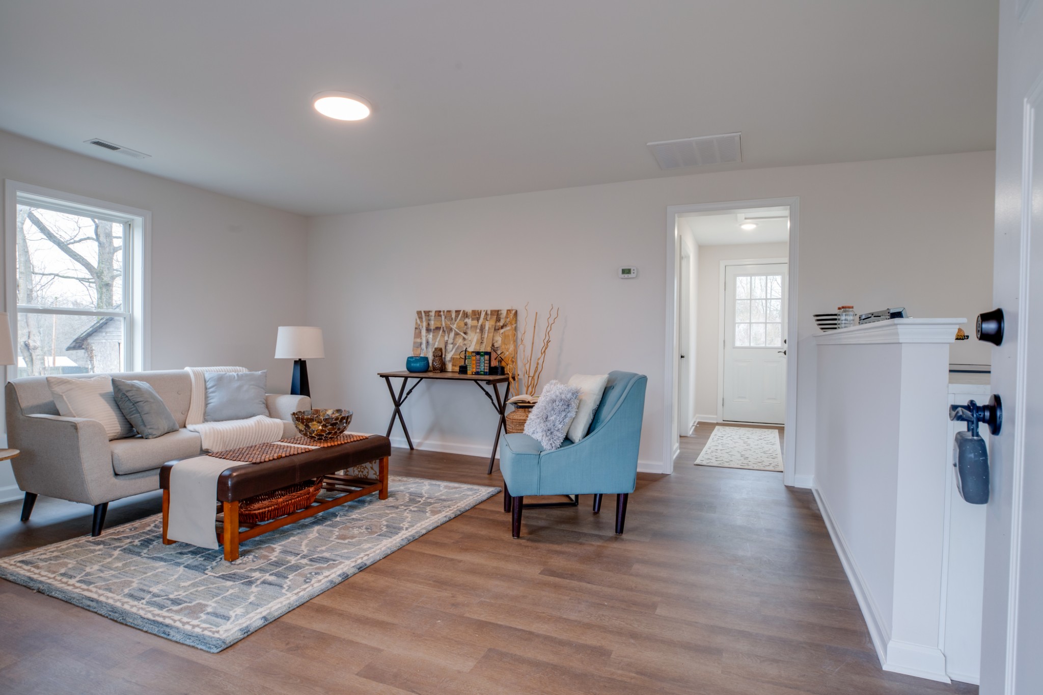 324 Cowan Road Dickson, TN 37055 - Photo 1 of 18 a living room with furniture and a wooden floor