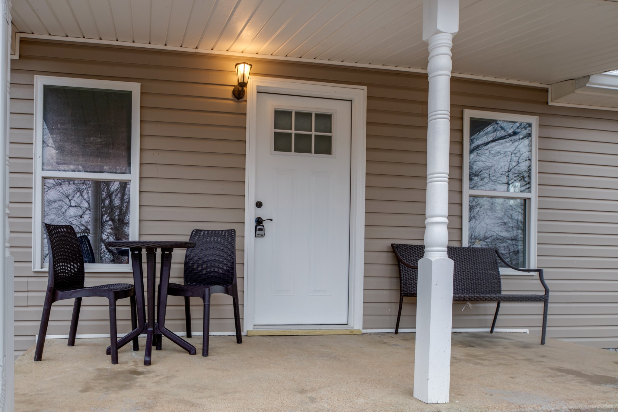 324 Cowan Road Dickson, TN 37055 - Photo 14 of 18 a front view of a house with table and chairs