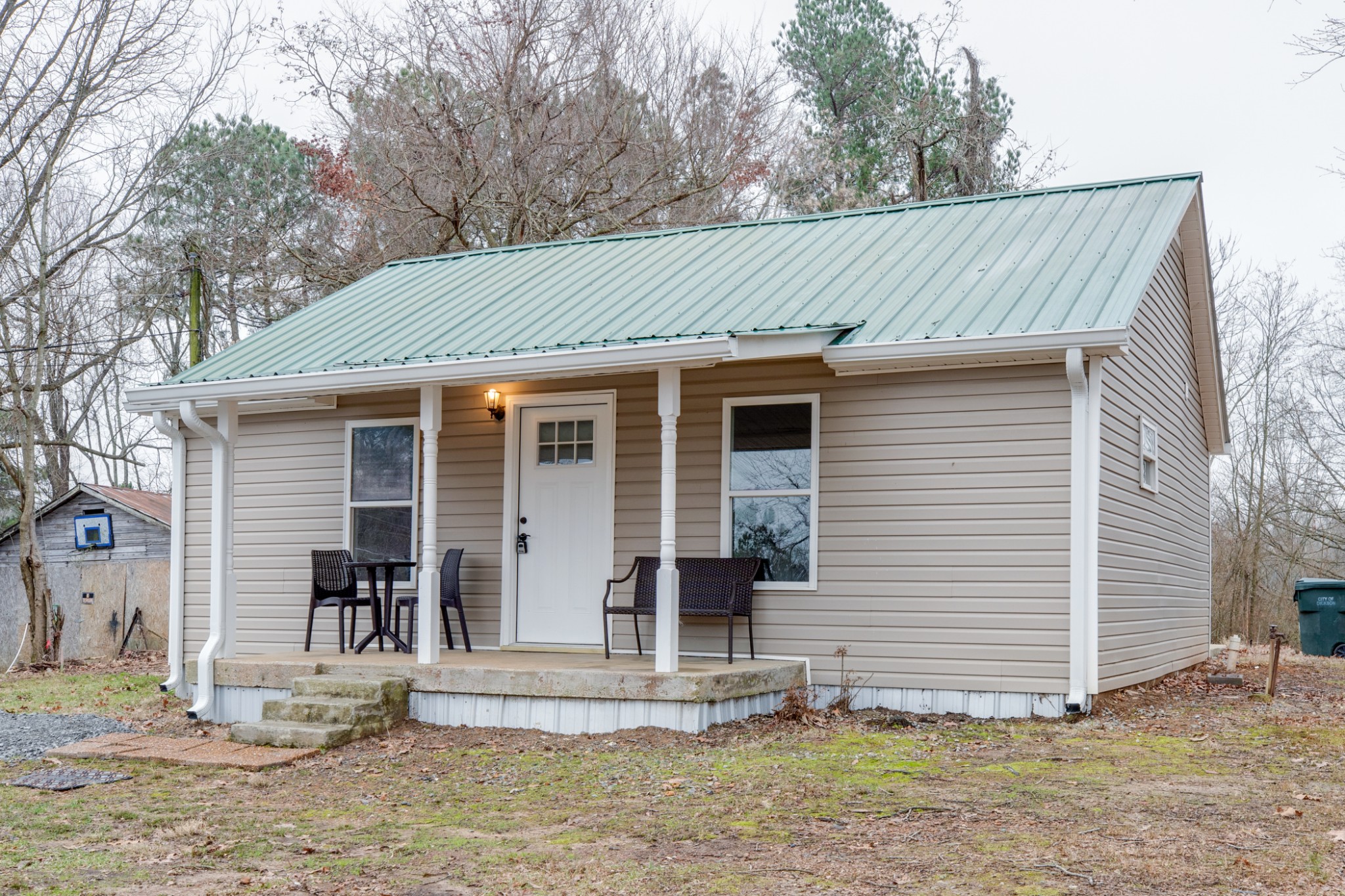 324 Cowan Road Dickson, TN 37055 - Photo 15 of 18 a view of a house with a yard and garage