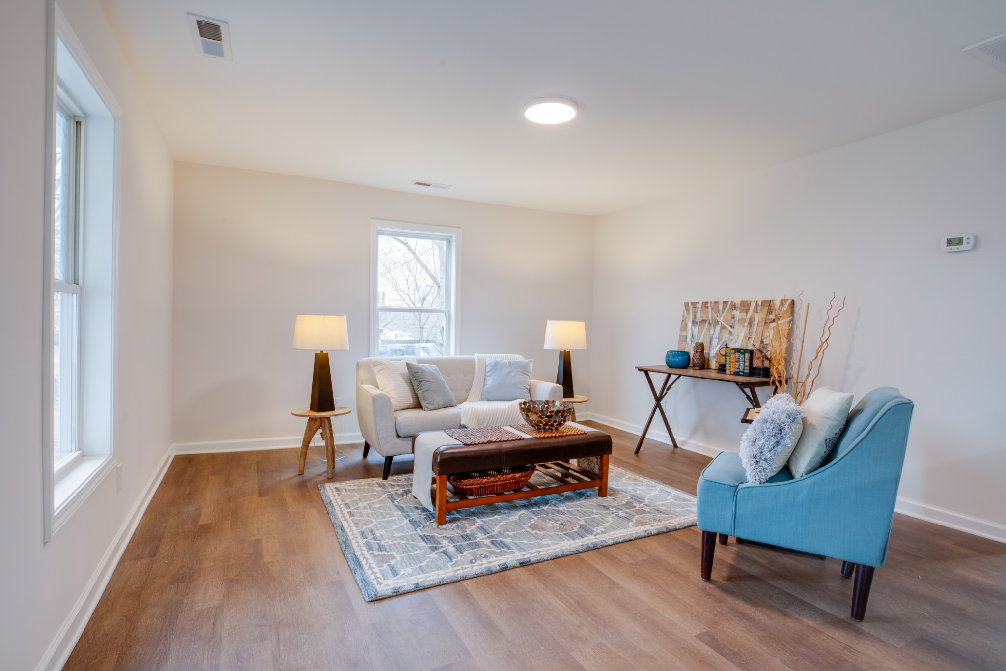 324 Cowan Road Dickson, TN 37055 - Photo 3 of 18 a living room with furniture and a wooden floor