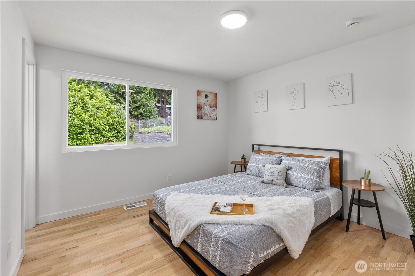 10646 Southeast 236th Street Kent, WA 98031 - Photo 10 of 20 a bedroom with a bed and a window