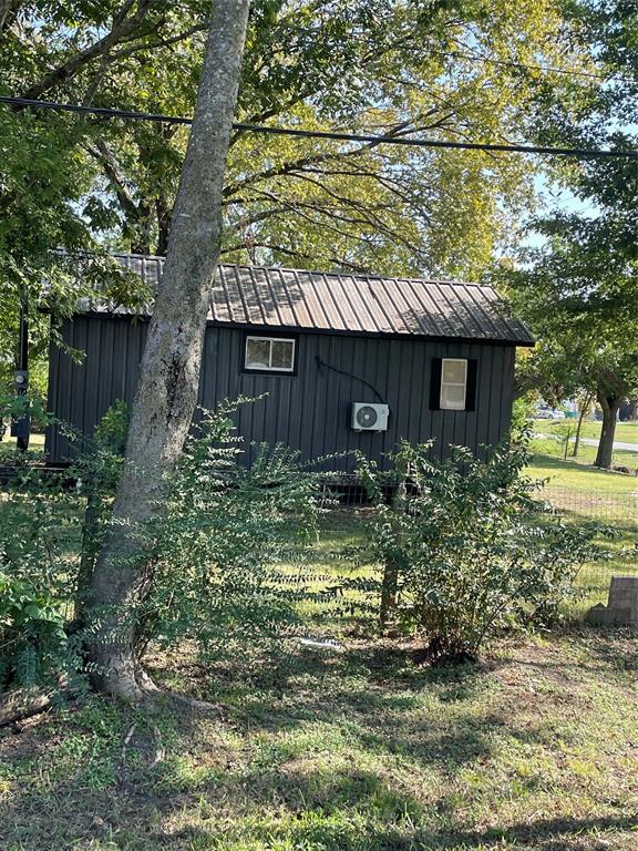 311 Southwest 6th Street Kerens, TX 75144 - Photo 13 of 24 a view of a house with a yard
