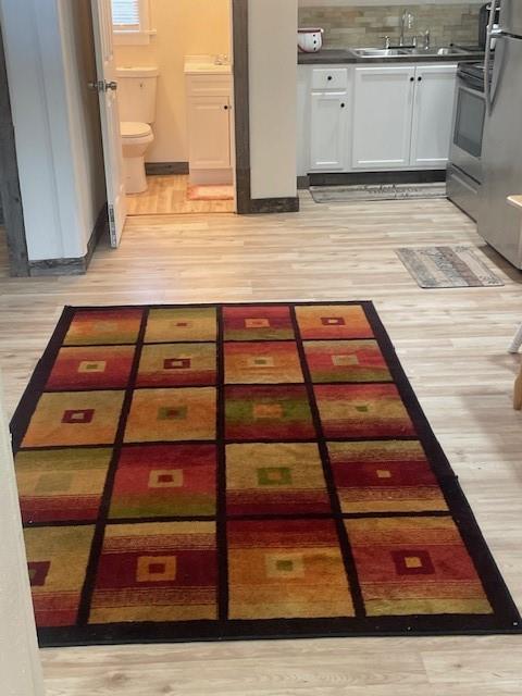 311 Southwest 6th Street Kerens, TX 75144 - Photo 19 of 24 a view of a kitchen with wooden floor