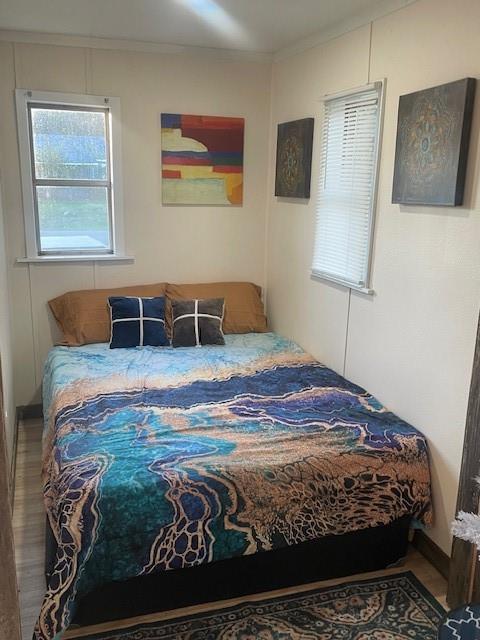 311 Southwest 6th Street Kerens, TX 75144 - Photo 23 of 24 a bedroom with a bed and a lamp on the dresser