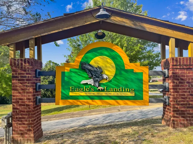 a sign that is on the side of a building