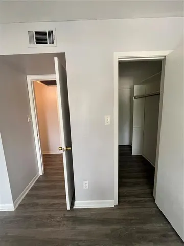 a view of small space with wooden floor