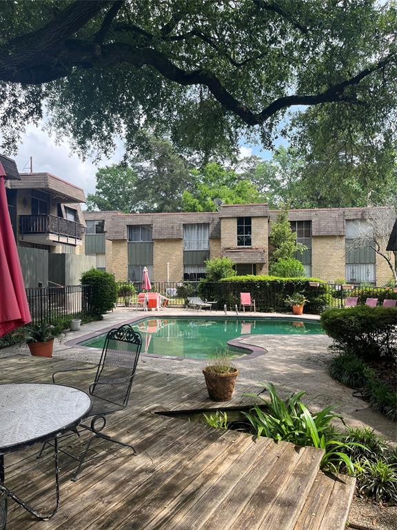 7000 Creswell Road, Unit 223 Shreveport, LA 71106 - Photo 15 of 16 a view of backyard of the house along with seating space