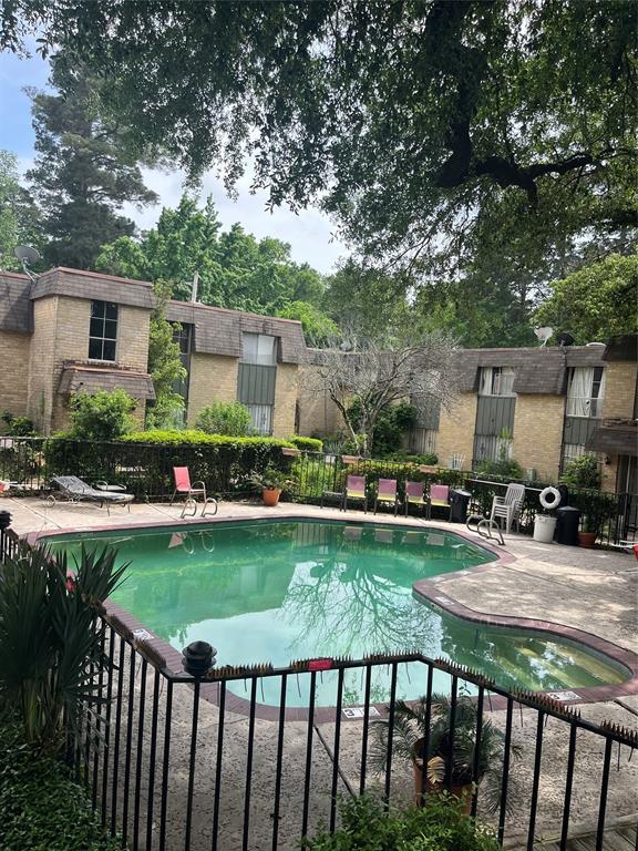 7000 Creswell Road, Unit 223 Shreveport, LA 71106 - Photo 16 of 16 a view of a house with backyard and sitting area