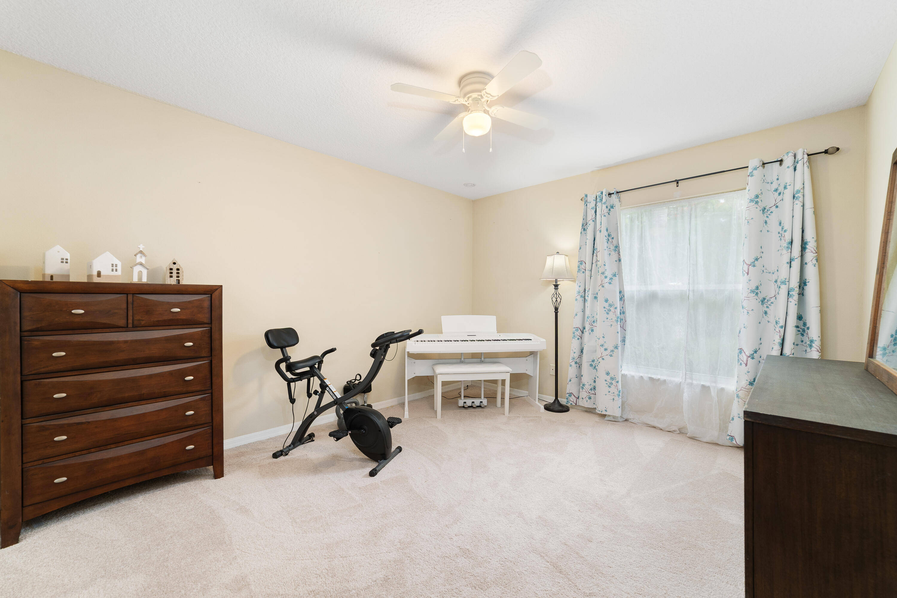 4292 Southwest Whitebread Road Port St. Lucie, FL 34953 - Photo 17 of 28 a view of a workspace with furniture