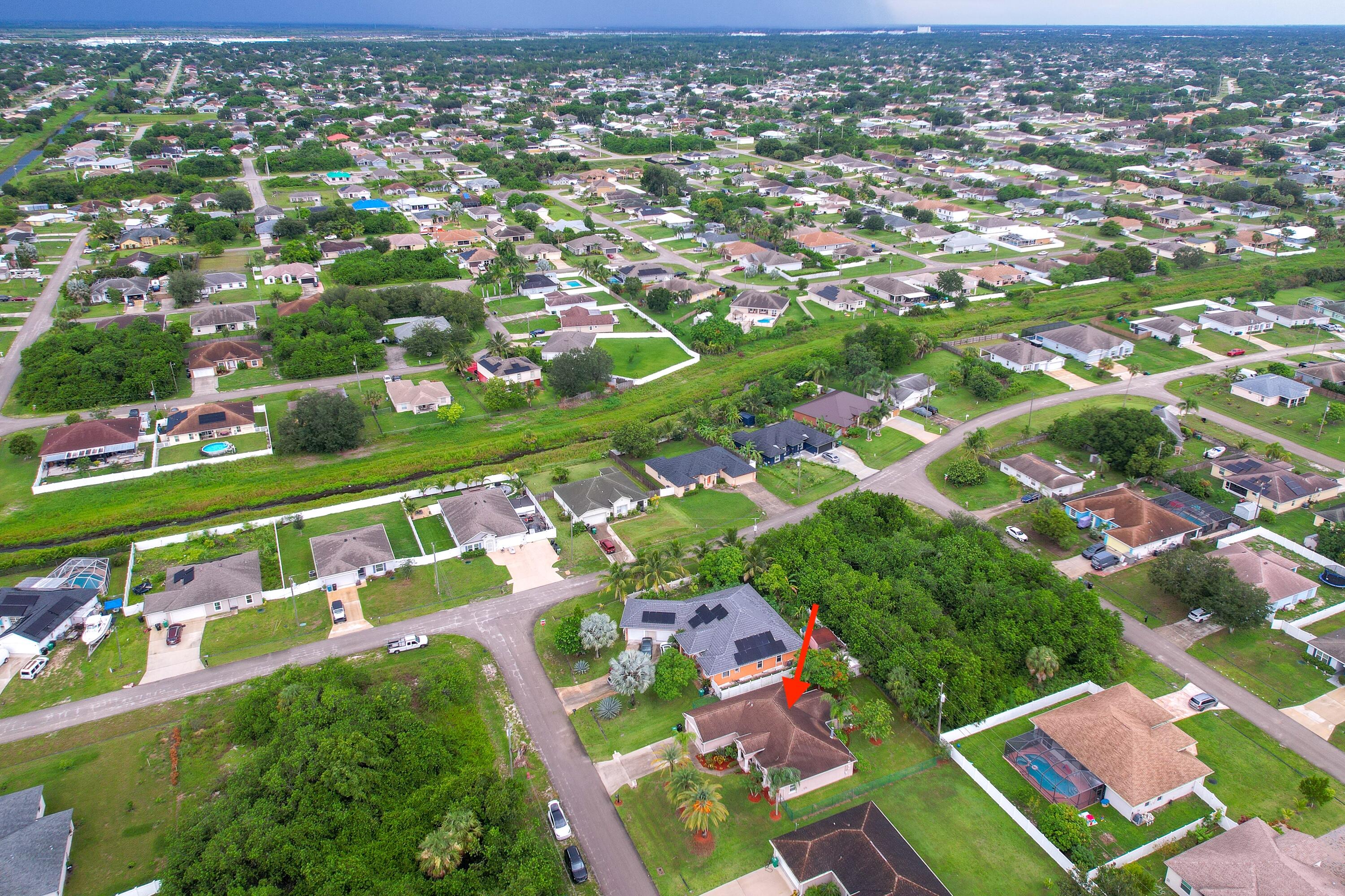 4292 Southwest Whitebread Road Port St. Lucie, FL 34953 - Photo 27 of 28 an aerial view of a city