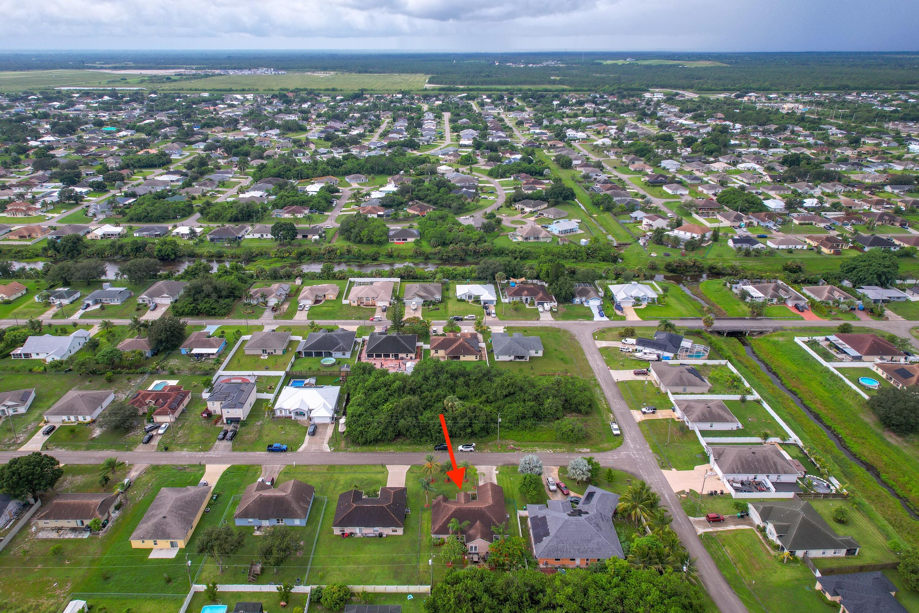 4292 Southwest Whitebread Road Port St. Lucie, FL 34953 - Photo 28 of 28 an aerial view of multiple house