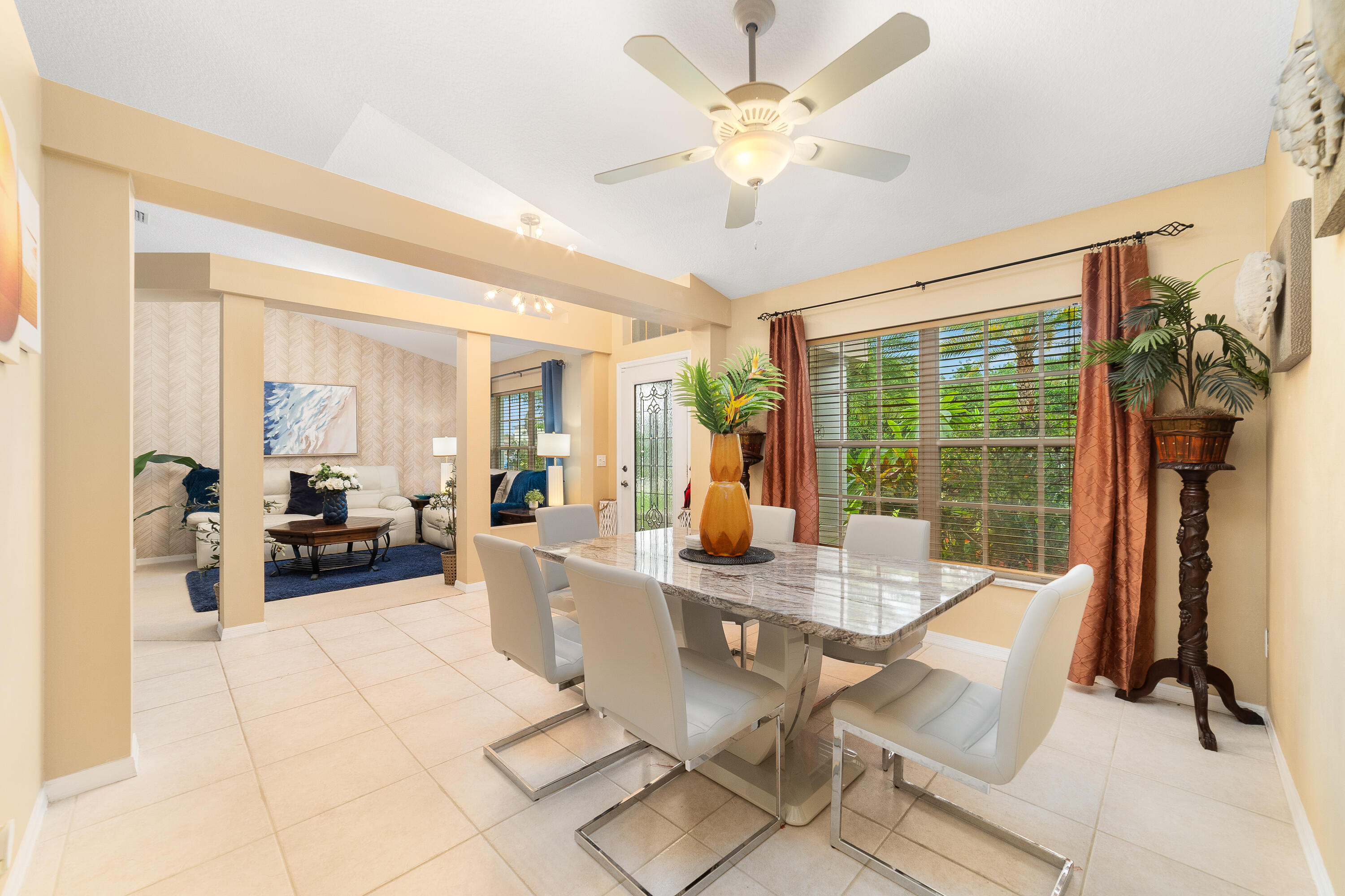 4292 Southwest Whitebread Road Port St. Lucie, FL 34953 - Photo 3 of 28 a view of a dining room with furniture window and outside view