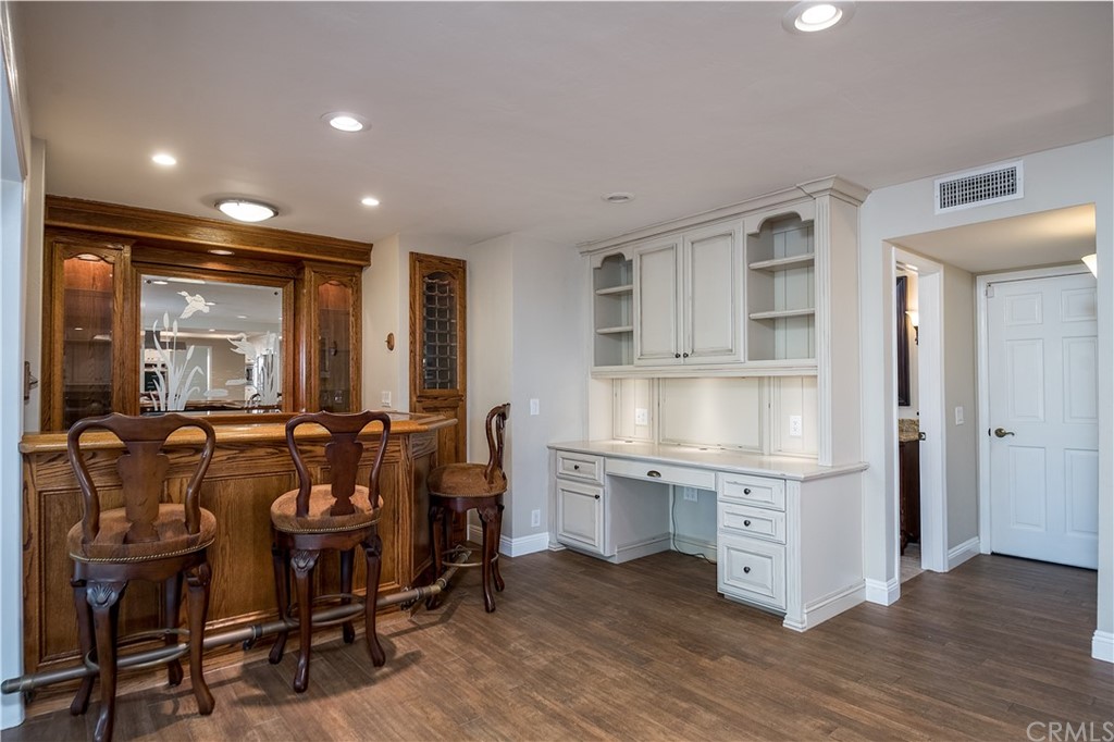 12513 Carinthia Drive Whittier, CA 90601 - Photo 12 of 35 a living room with furniture and a wooden floor
