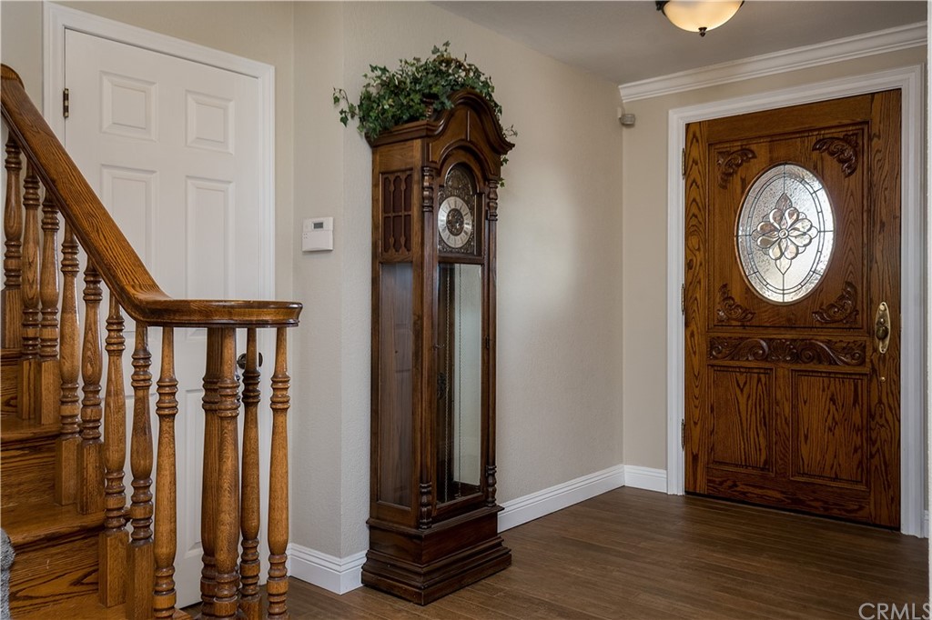 12513 Carinthia Drive Whittier, CA 90601 - Photo 3 of 35 a view of a hallway with wooden floor