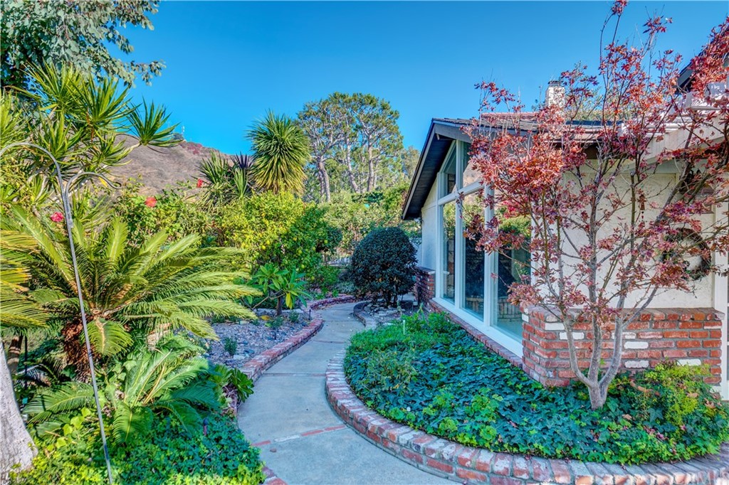 12513 Carinthia Drive Whittier, CA 90601 - Photo 30 of 35 a view of a house with a yard