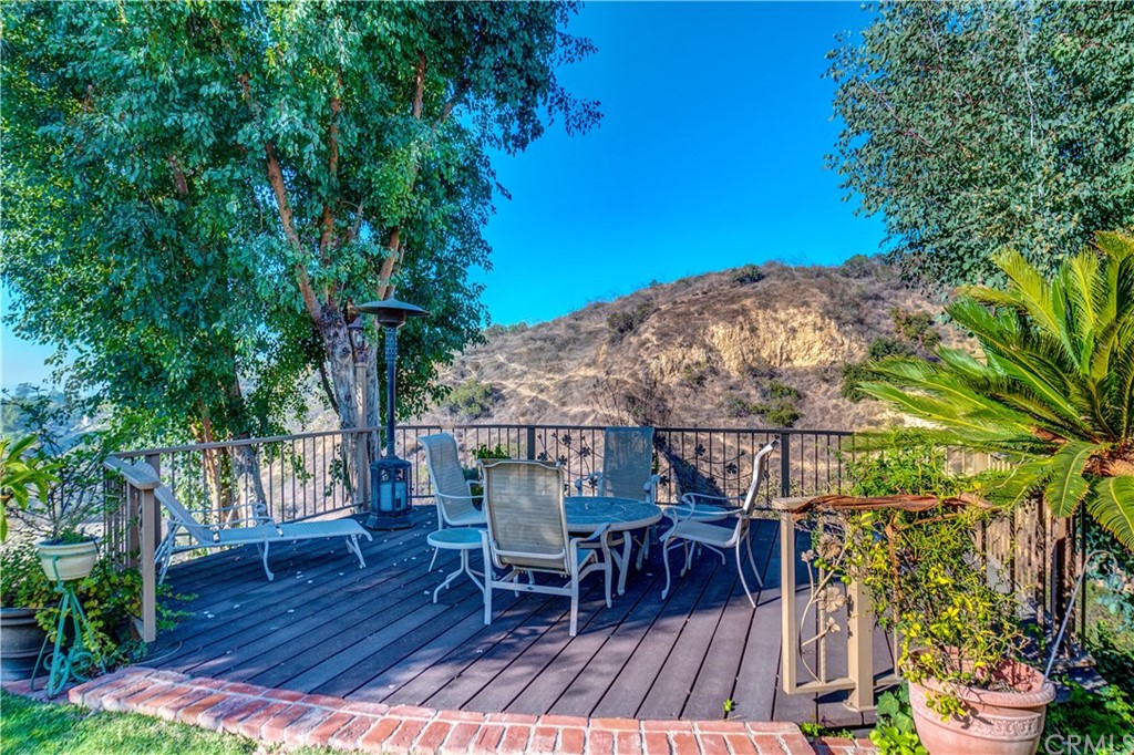 12513 Carinthia Drive Whittier, CA 90601 - Photo 34 of 35 a view of balcony with furniture and wooden floor