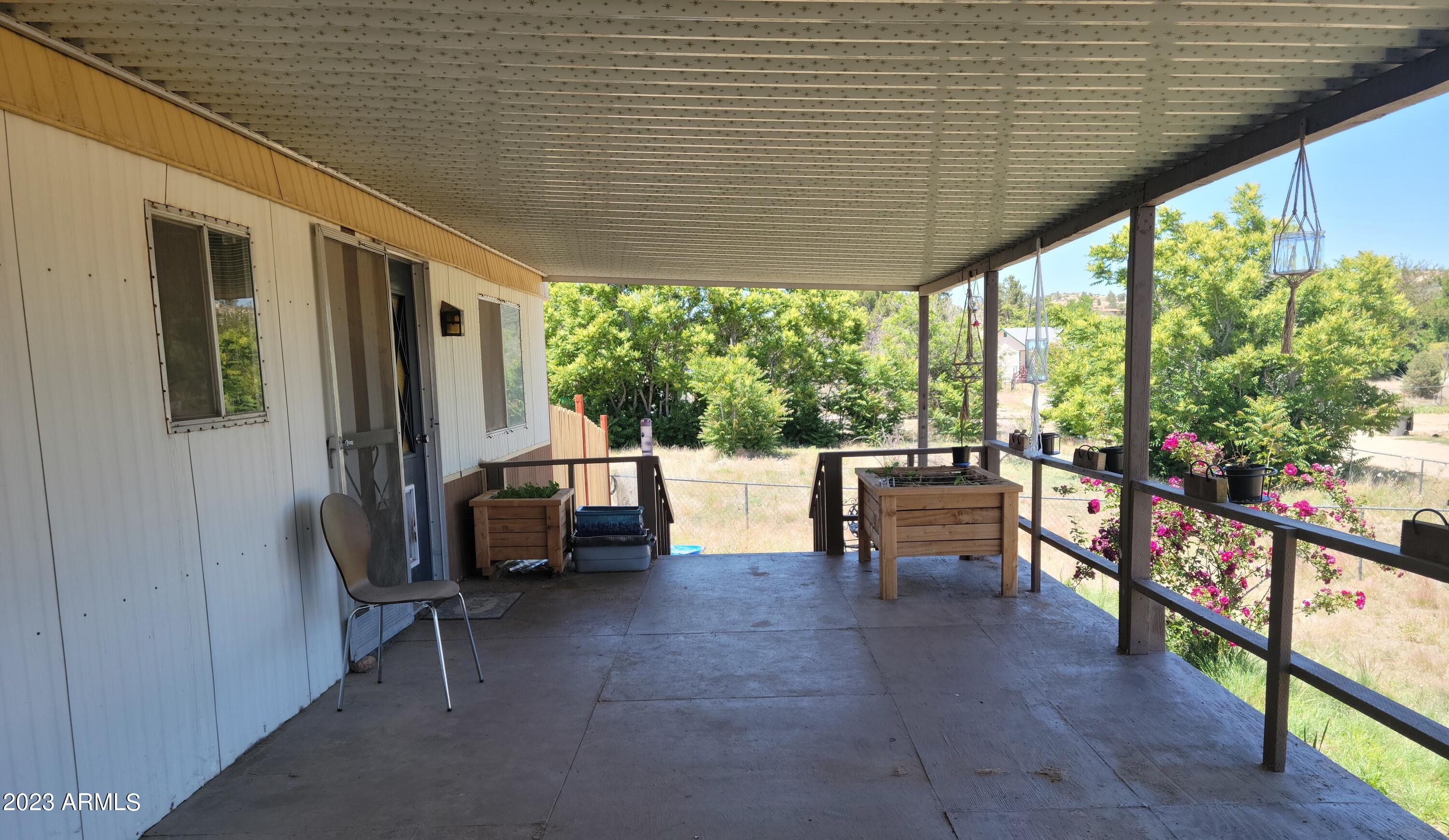 18388 Weaver Mountain Road Peeples Valley, AZ 86332 - Photo 22 of 24 front deck
