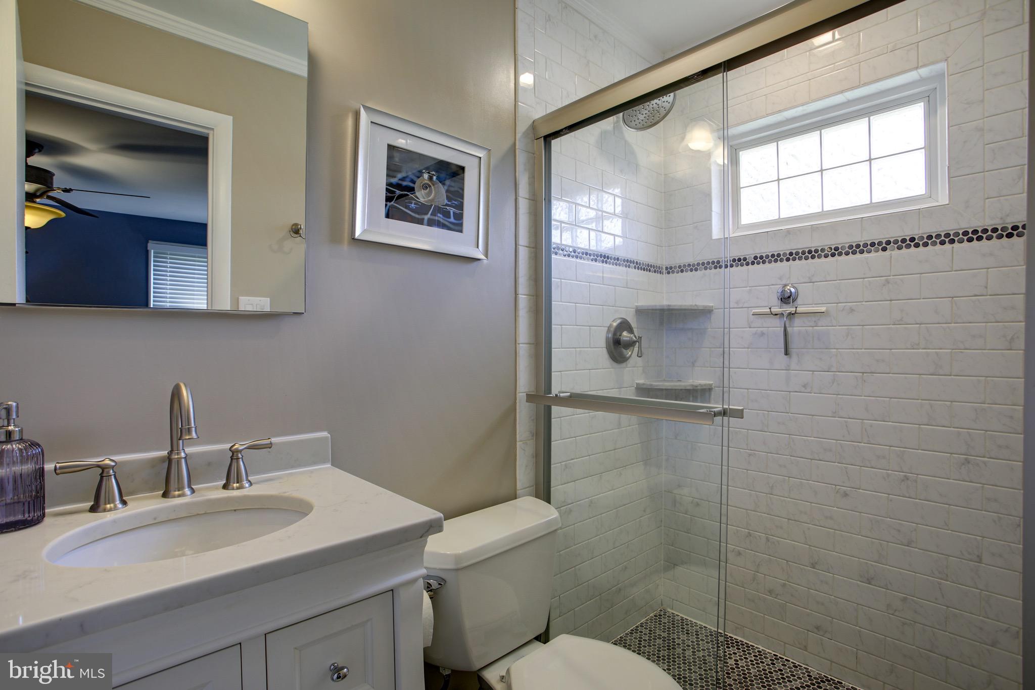 10101 Greenock Road Silver Spring, MD 20901 - Photo 22 of 36 Primary bedroom en suite bathroom