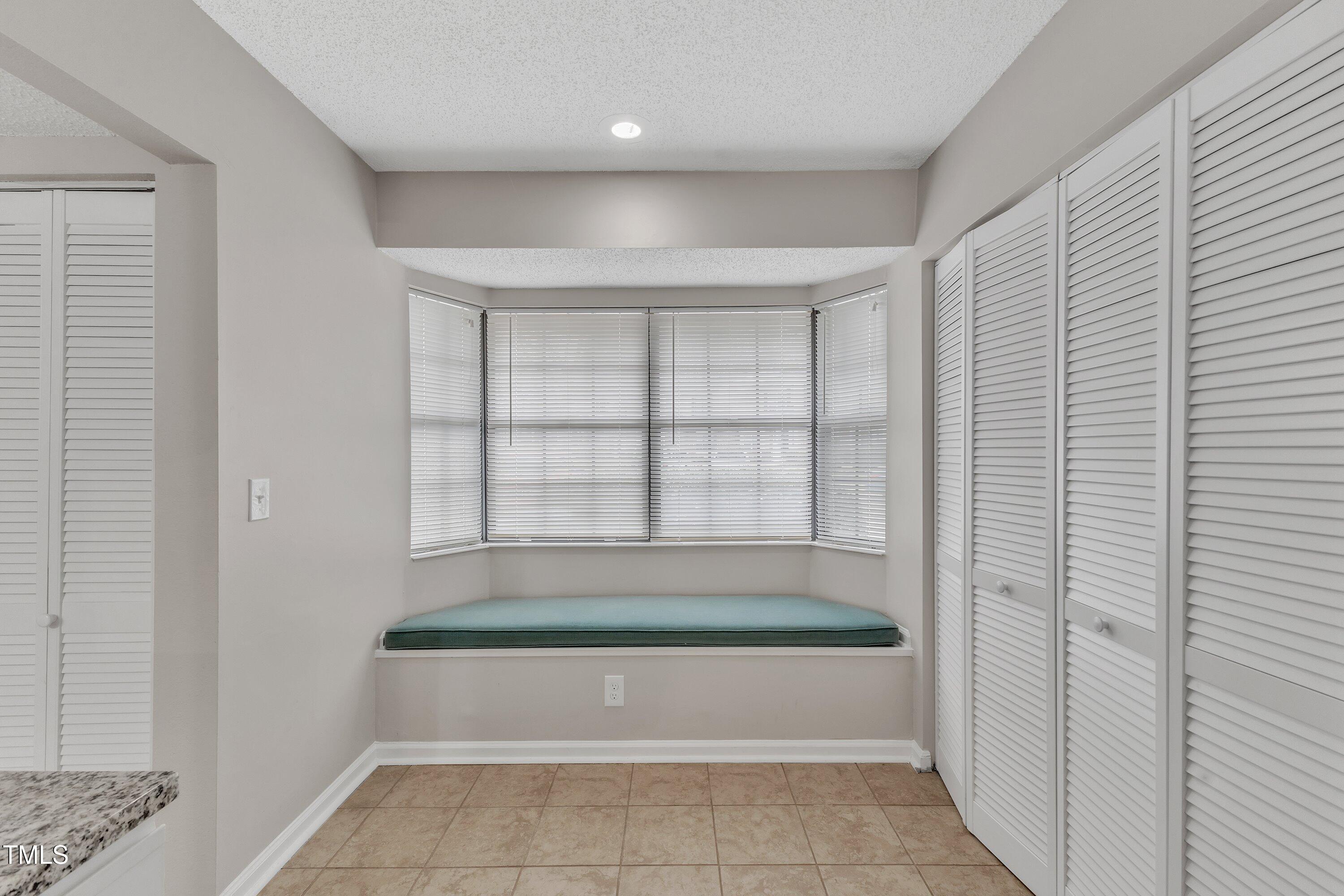 7811 Falcon Rest Circle Raleigh, NC 27615 - Photo 19 of 39 a bathroom with bathtub and shower