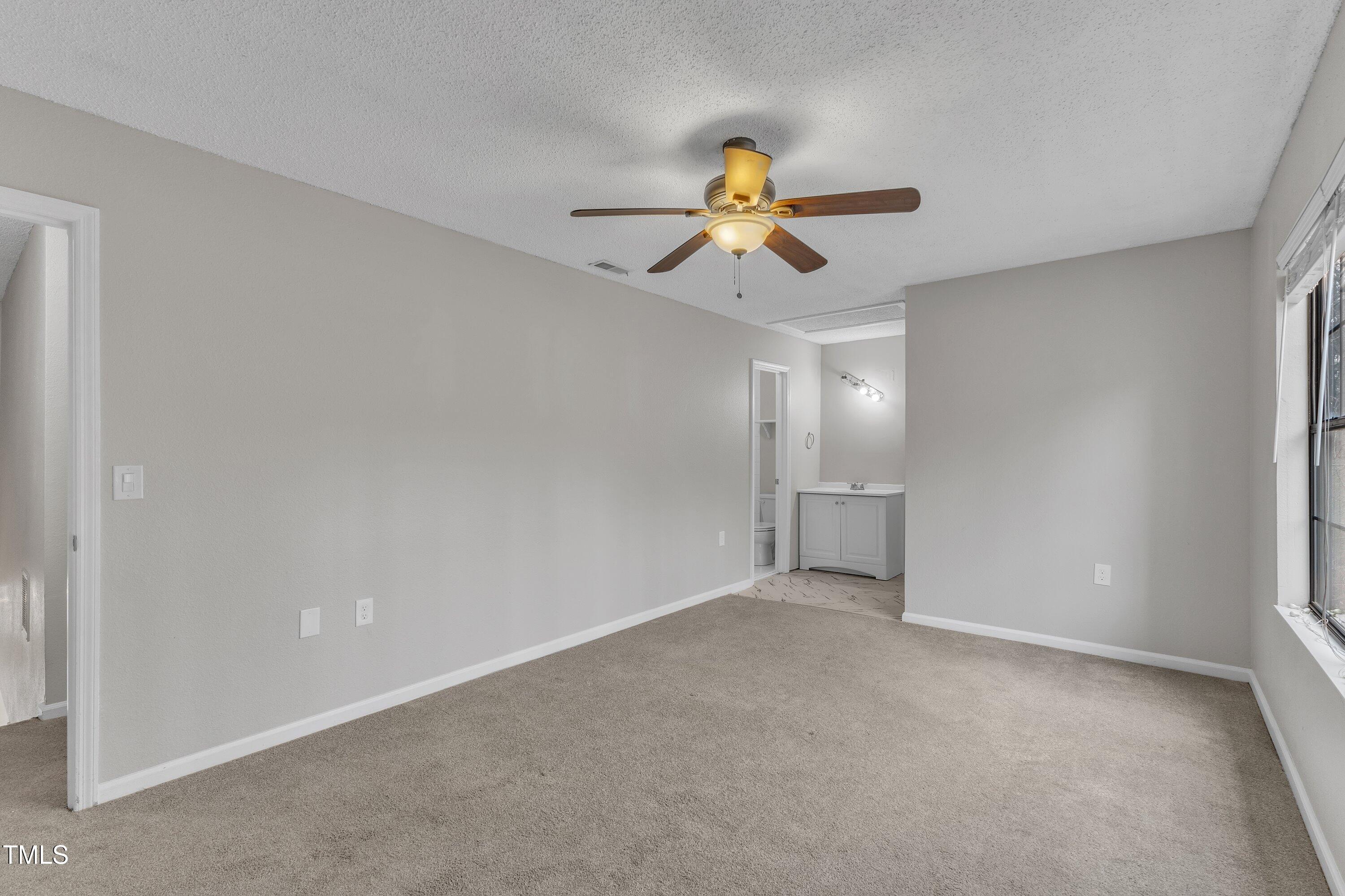 7811 Falcon Rest Circle Raleigh, NC 27615 - Photo 28 of 39 a view of an empty room
