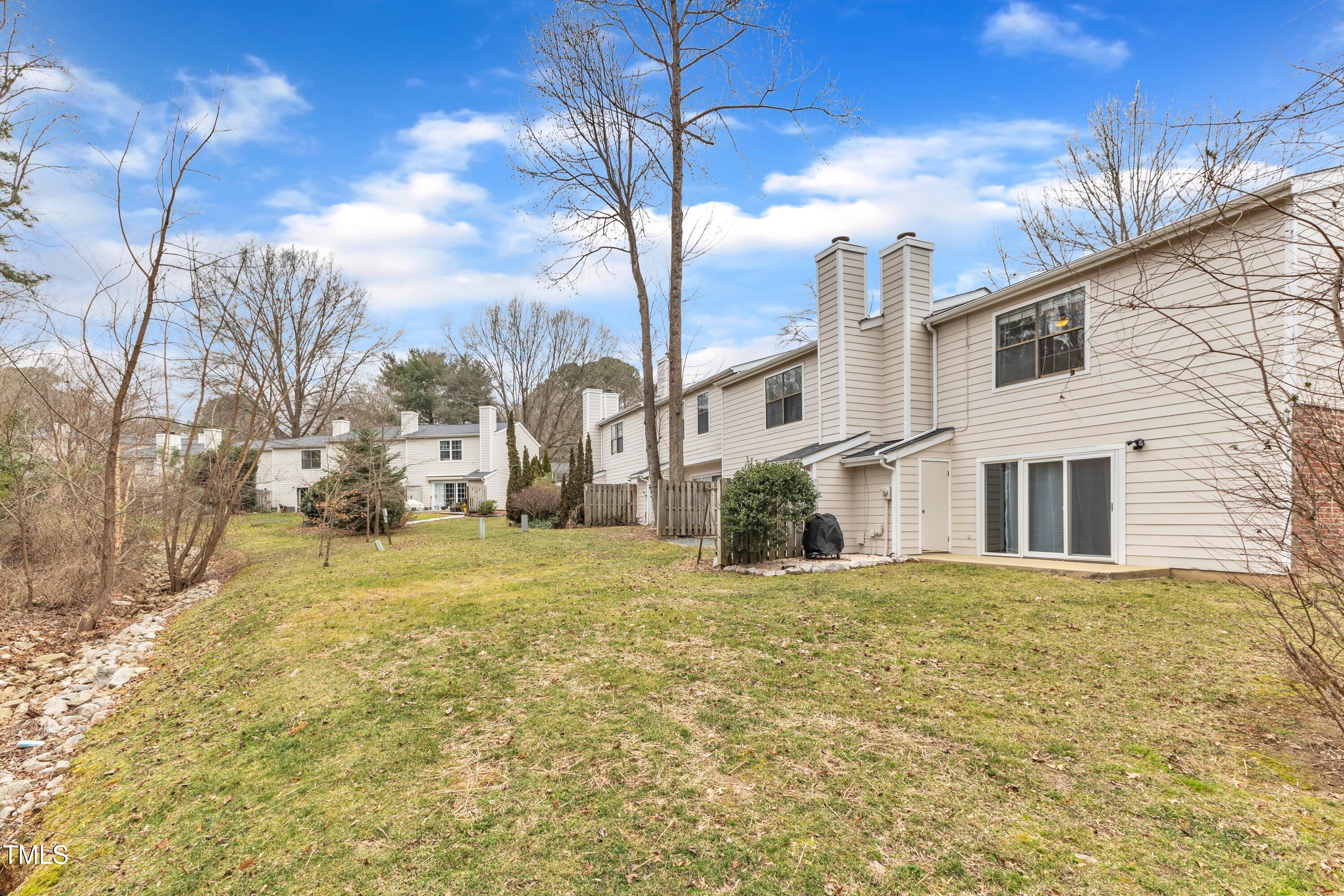7811 Falcon Rest Circle Raleigh, NC 27615 - Photo 38 of 39 a view of a house with a big yard