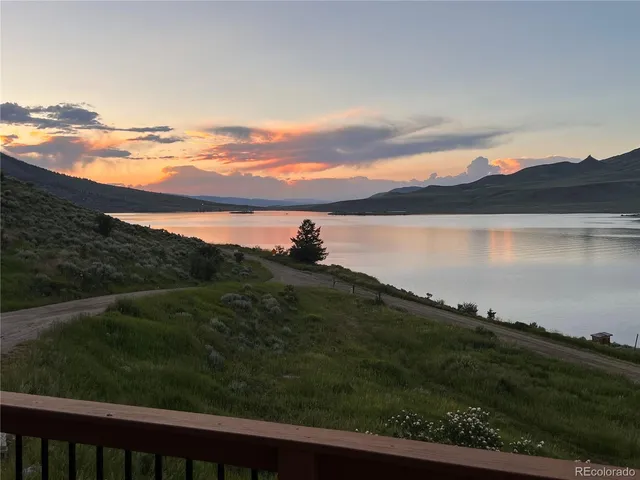 a view of a lake from a yard