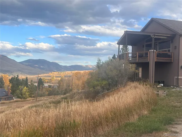 a view of balcony with furniture