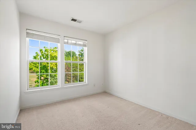 an empty room with window