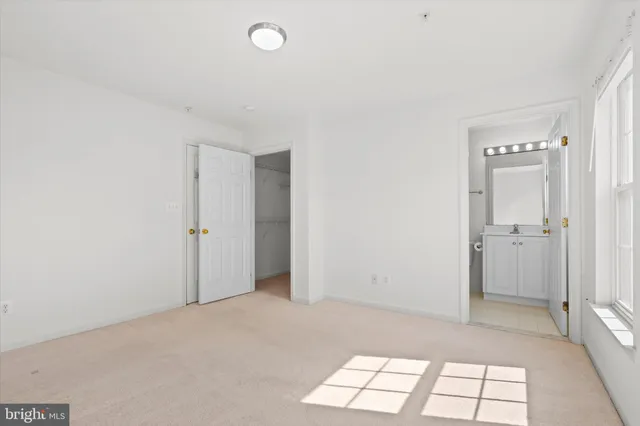 a view of an empty room and window