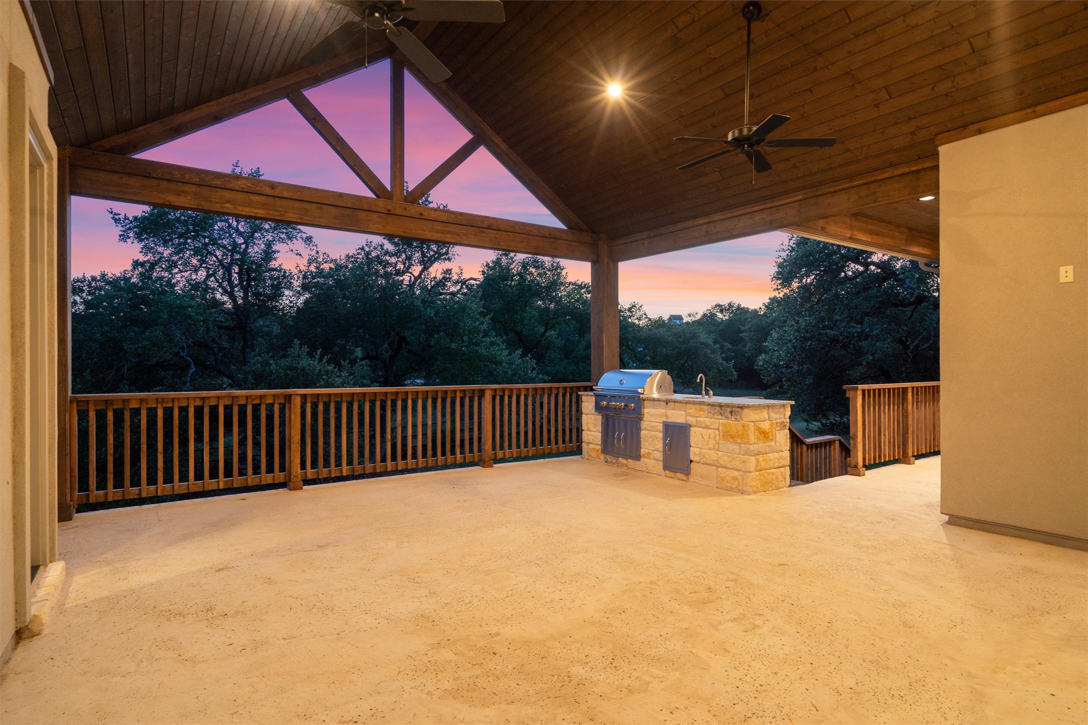 302 Highland Spring Lane Georgetown, TX 78633 - Photo 7 of 38 Huge vaulted ceiling-ed patio with cooking grill.