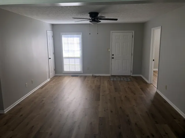 a bathroom with a toilet and a vanity