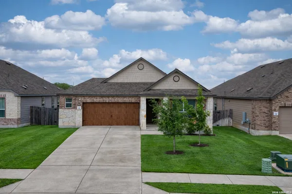 a front view of house with yard