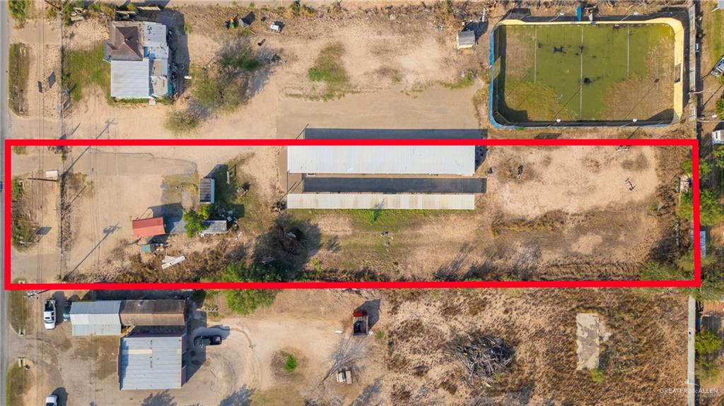 3408 West Mile 5 Road Mission, TX 78574 - Photo 12 of 21 a small white building with red and white red