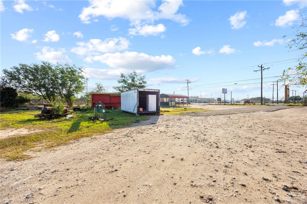 3408 West Mile 5 Road Mission, TX 78574 - Photo 21 of 21 a view of a swimming pool with a house
