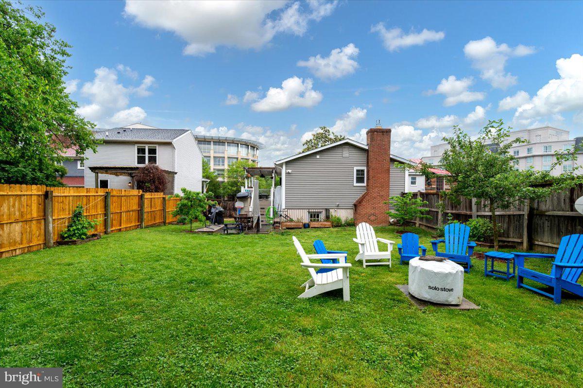57 Spa Road Annapolis, MD 21401 - Photo 37 of 39 a view of a house with backyard sitting area and garden