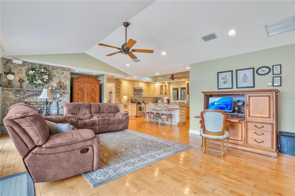 11450 Fangorn Road Orlando, FL 32825 - Photo 26 of 58 a living room with furniture and wooden floor