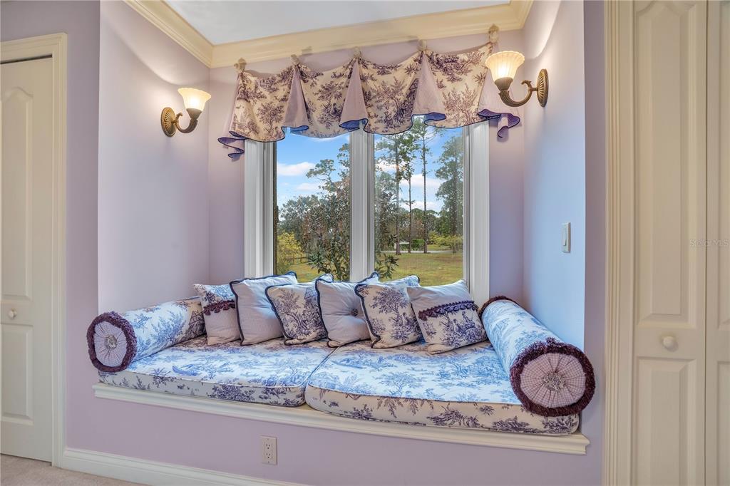 11450 Fangorn Road Orlando, FL 32825 - Photo 43 of 58 a dining room with furniture and a chandelier