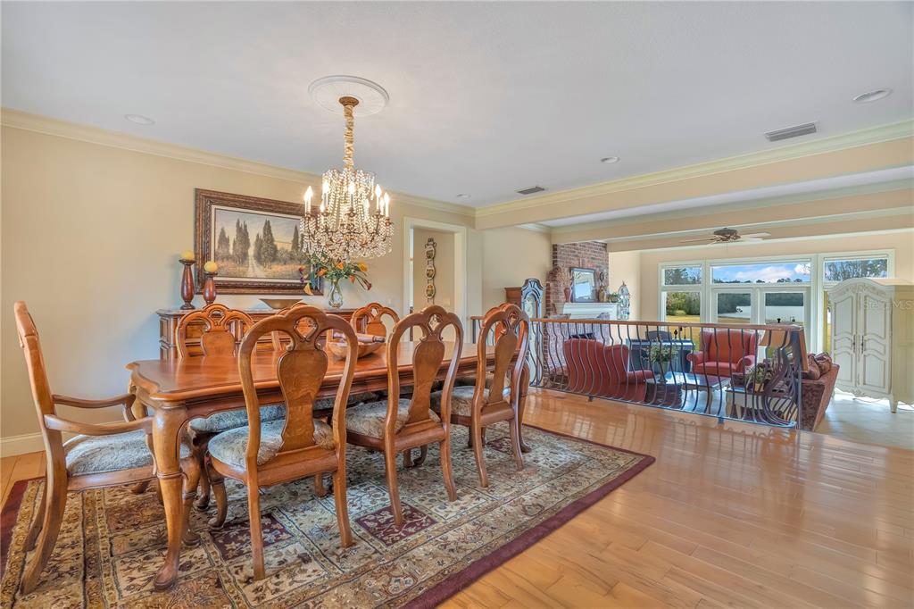 11450 Fangorn Road Orlando, FL 32825 - Photo 6 of 58 a view of a dining room with furniture window and wooden floor
