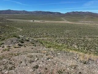 a view of an outdoor space and a mountain
