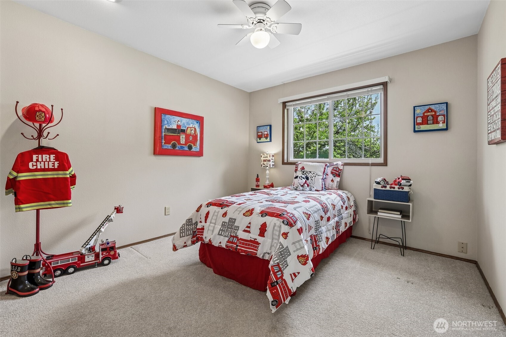 15601 160th Court Southeast Renton, WA 98058 - Photo 12 of 19 a spacious bedroom with a bed and a chandelier