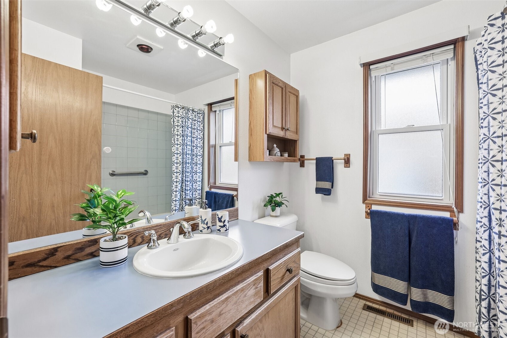 15601 160th Court Southeast Renton, WA 98058 - Photo 13 of 19 a bathroom with a sink toilet and shower