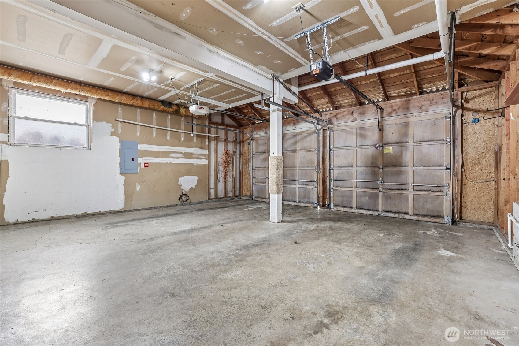 15601 160th Court Southeast Renton, WA 98058 - Photo 16 of 19 a view of empty room with wooden walls